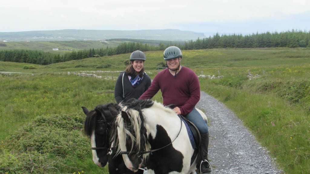 Kate and Jeremy horseback riding near Doolin Ireland in 2015--taking a horseback ride here is one of the best things to do in Doolin!