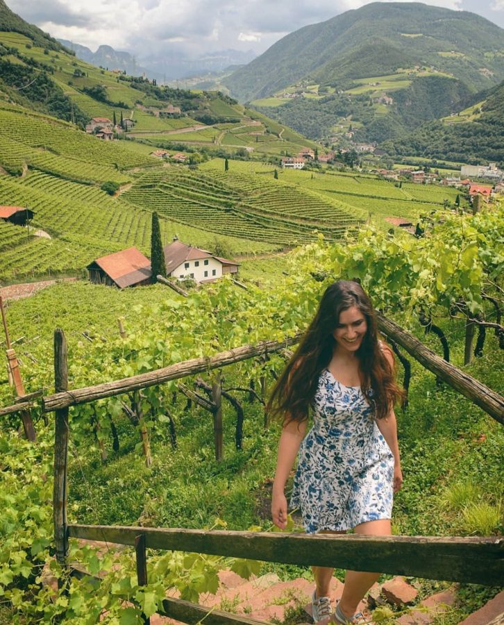 kate storm in front of terraced vineyards in south tyrol near santa maddalena church when visiting bolzano italy