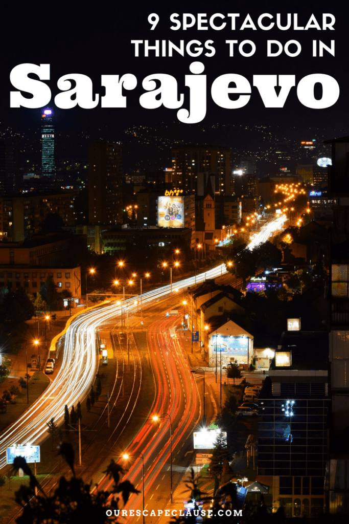 photo of sarajevo skyline at night, white text reads "spectacular things to do in sarajevo"