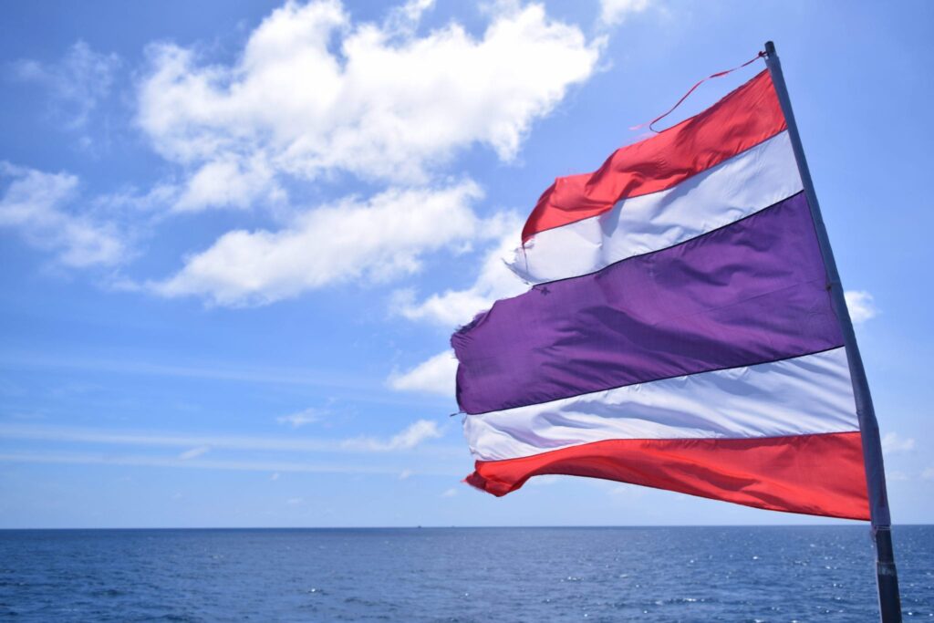 red white and blue striped flag on a koh tao dive boat