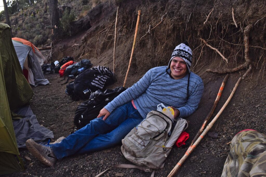 jeremy storm at camp with luggage on acatenango