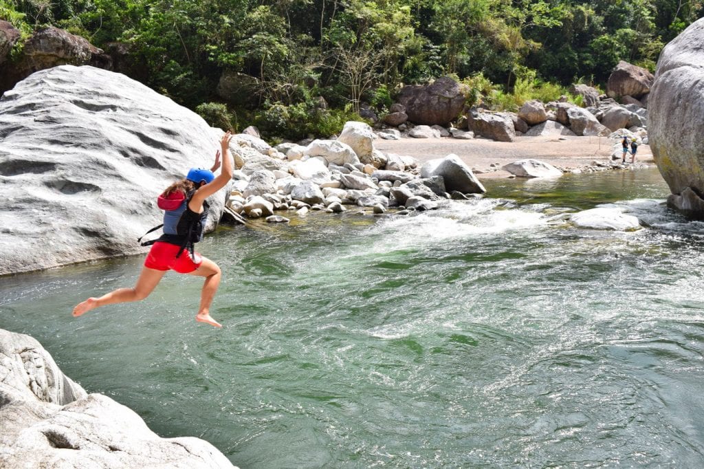 Packing List for Central America and Mexico: Girl Jumping into River