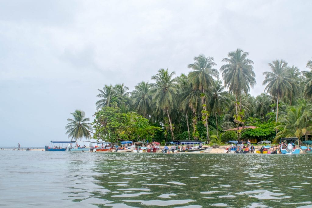 boats parked at a small island near bocas del toro panama on a rainy day
