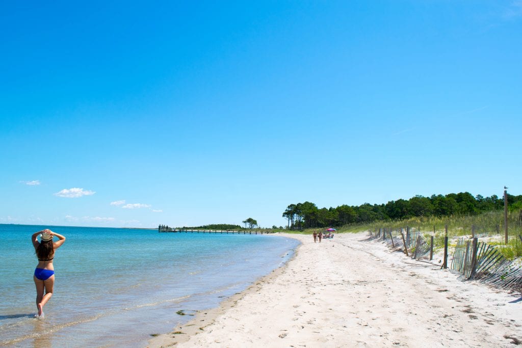 Kate Storm on a calm white sand beach at Cape Lookout National Seashore