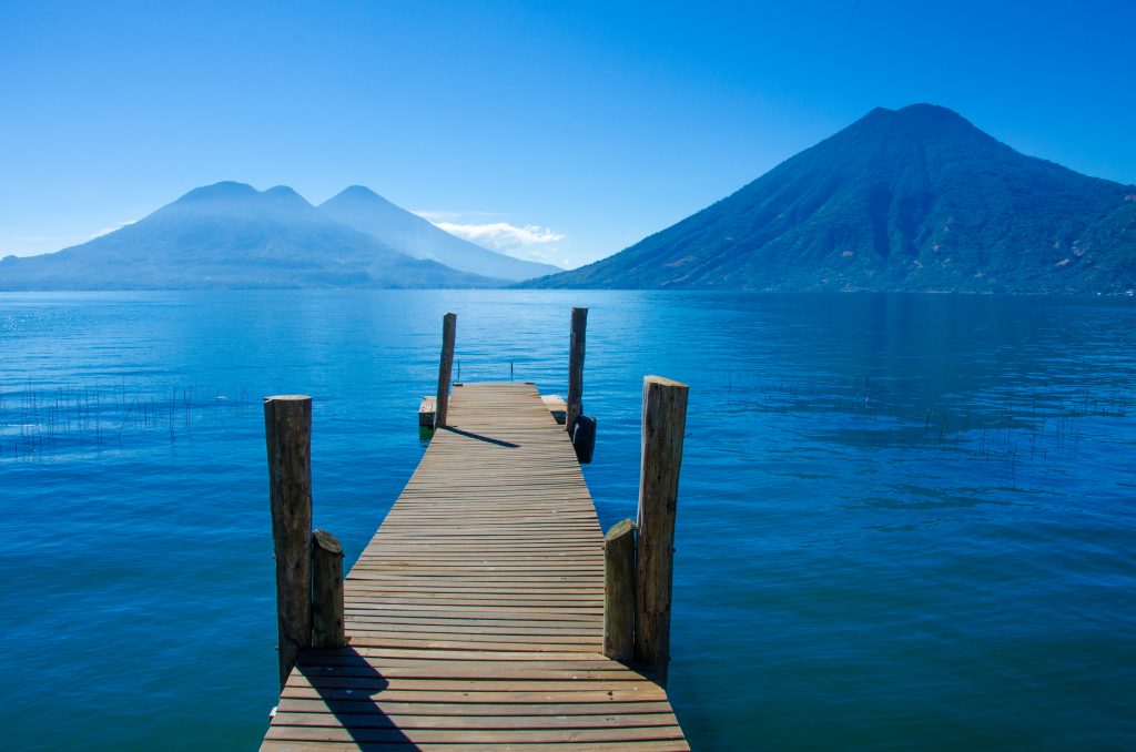 view of lake atitlan guatemala as seen from a pier on a guatemala vacation