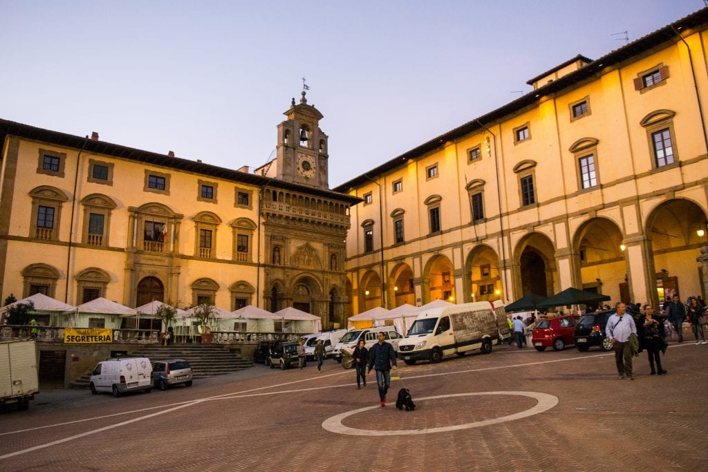 view of piazza grande in arezzo featuring sail clock tower