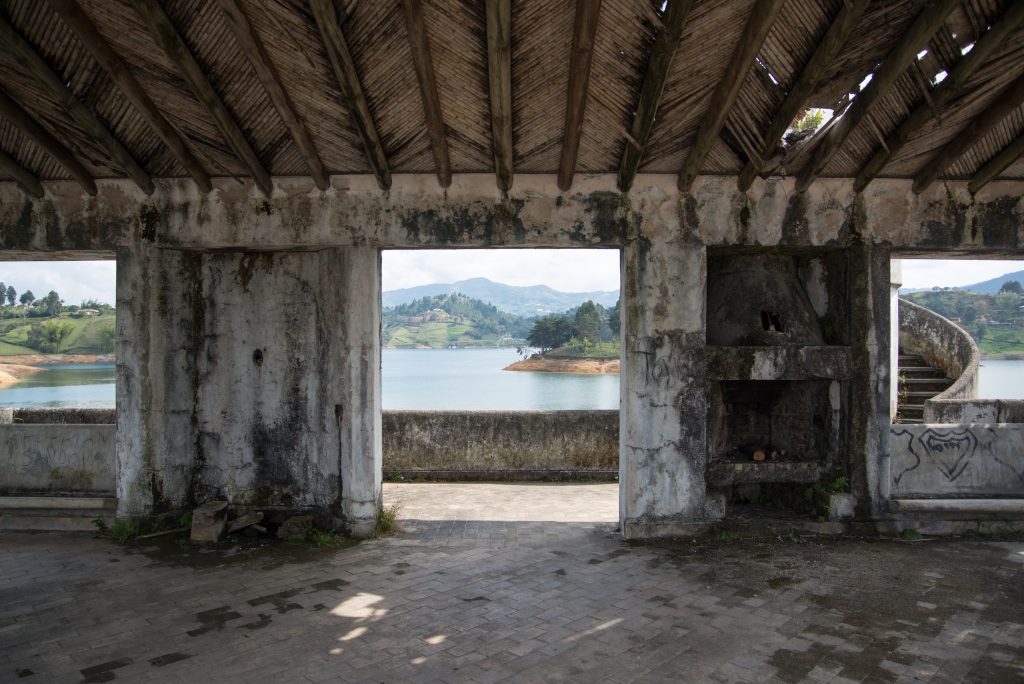 ruins of pablo escobar mansion in guatape colombia looking out over the lake