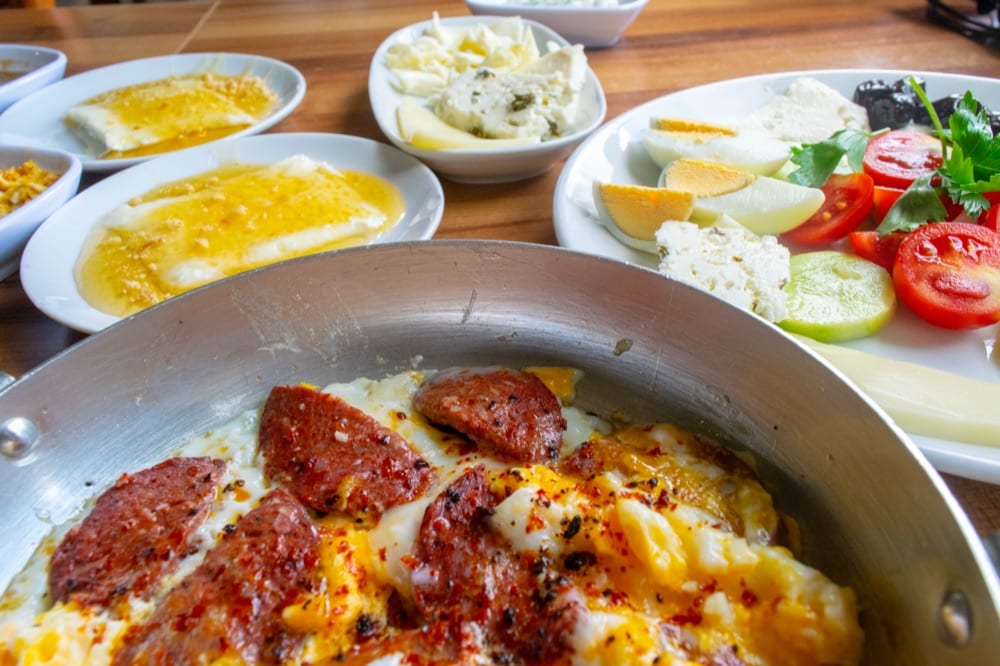 istanbul breakfast with menemen in the foreground