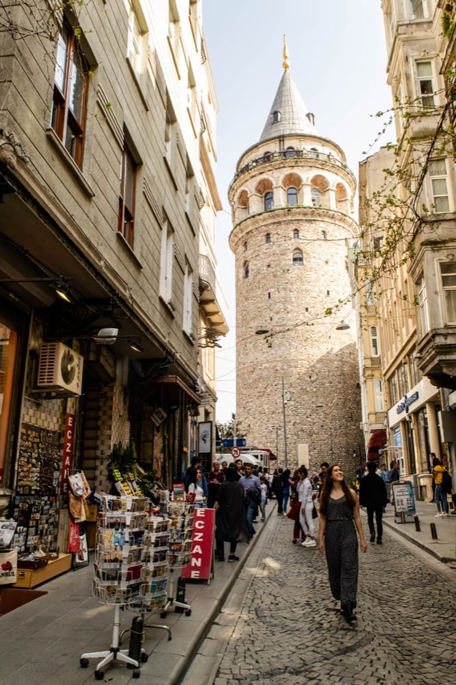 kate storm in front of galata tower, one of the best istanbul attractions