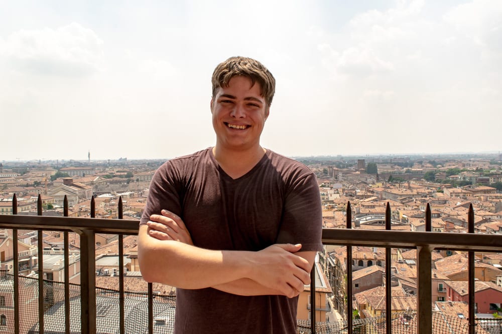 jeremy storm at the top of the torre dei lamberti, one of the top things to do verona italy