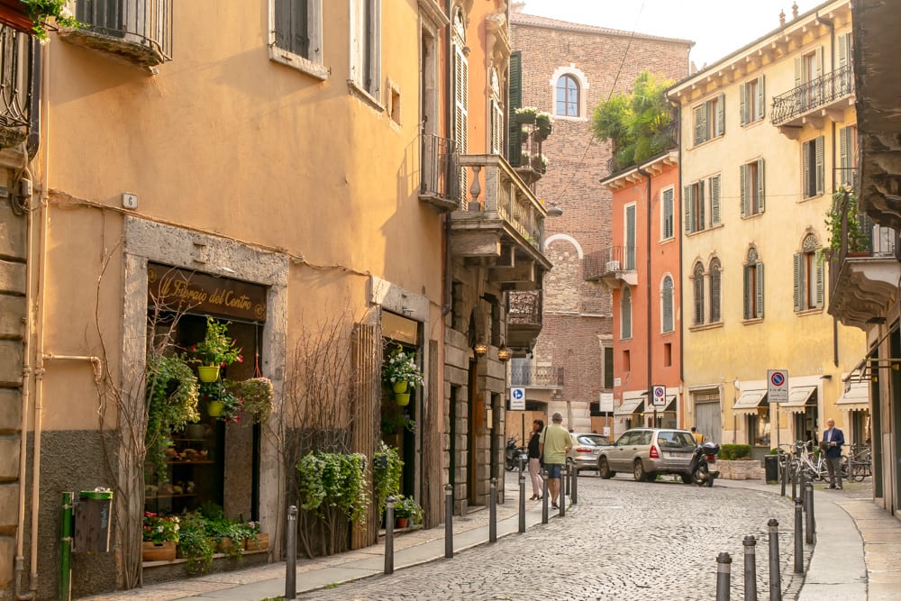 quiet street curving to the left in centro storico as seen when visiting verona