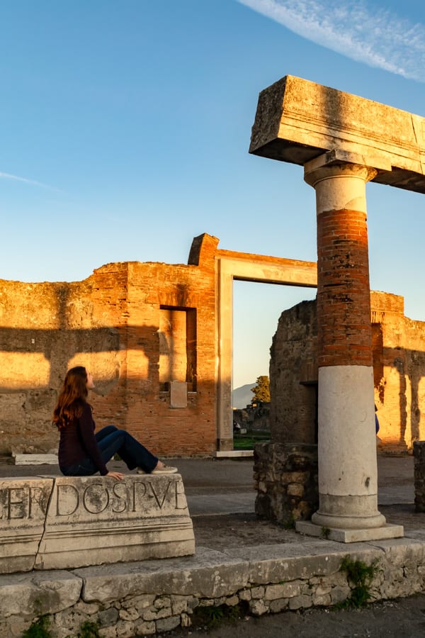 kate storm looking up at pompeii ruins