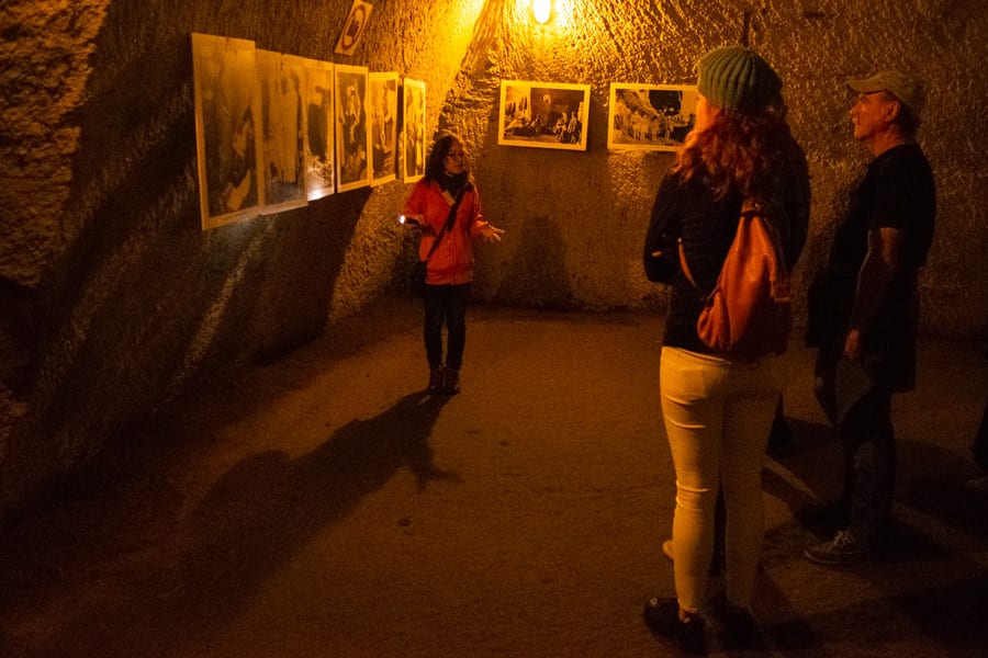 tour group inside the bourbon tunnel, as seenwhen spending a day in naples italy