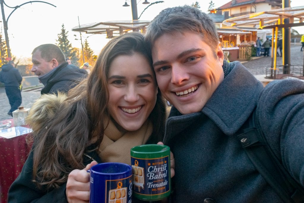 kate storm and jeremy storm at christmas market in soprabolzano