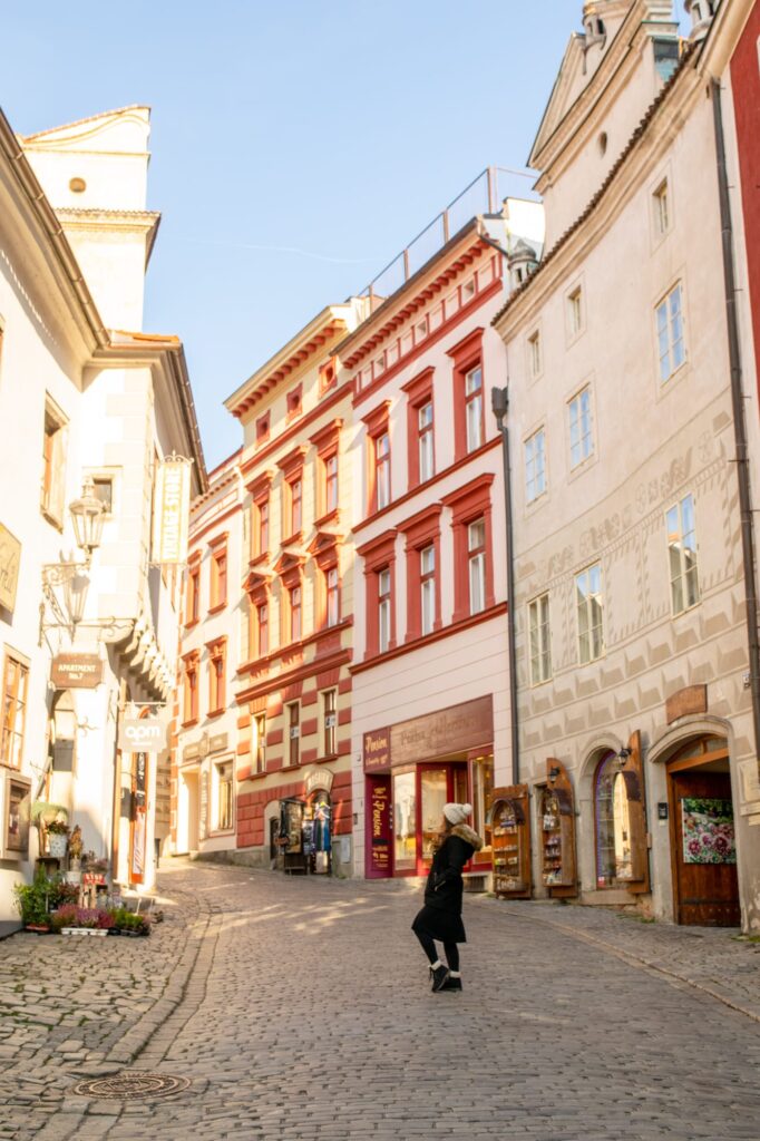 kate storm on a street in cesky krumlov winter morning