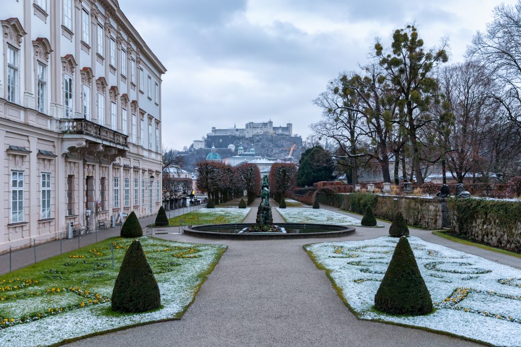 salzburg mirabell gardens in winter with a light dusting of snow
