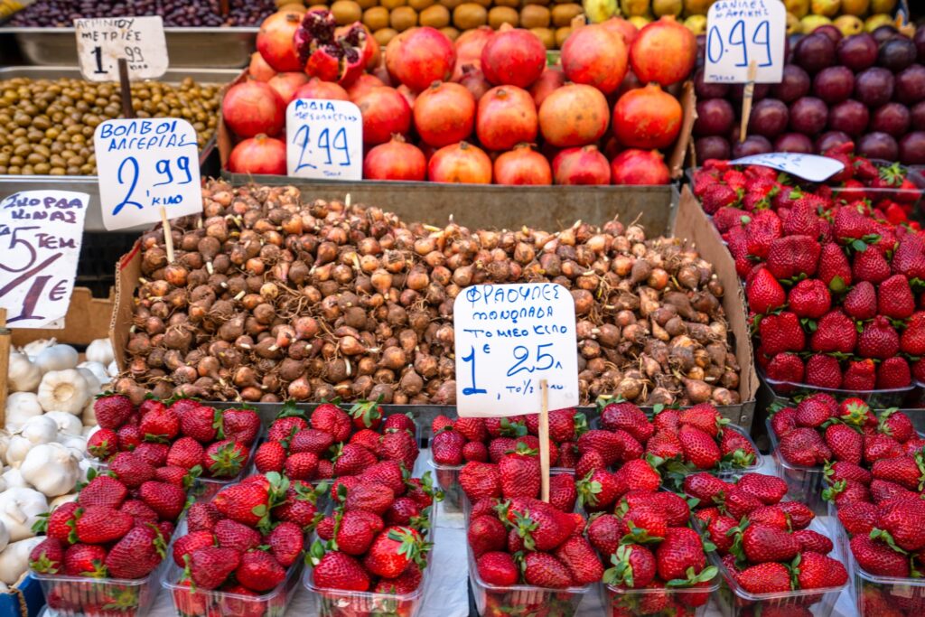Strawberries and other fruit being sold at food market, Athens food tour