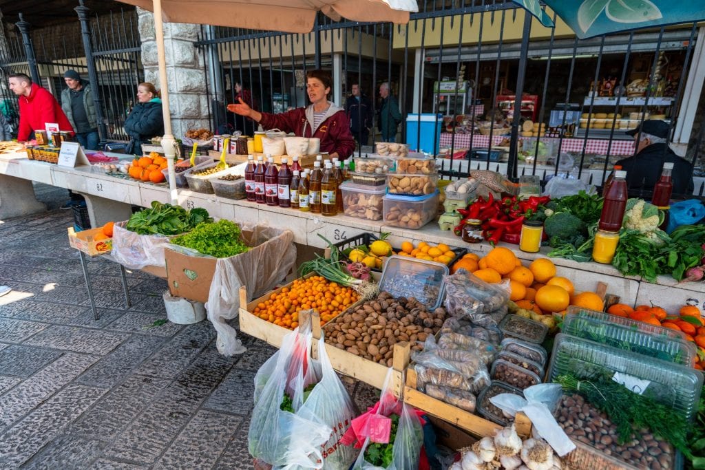 People shopping at Old Town Market, Best Things to Do in Kotor Montenegro