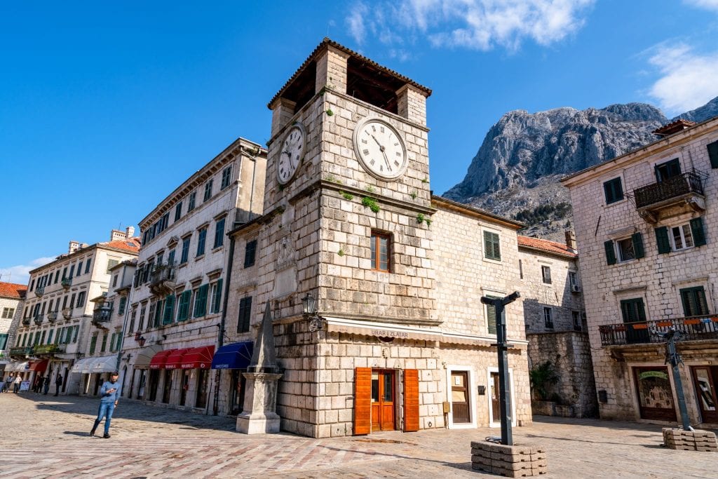 Clock tower in Kotor Montenegro--one of our travel tips for Europe is to get off the beaten path and find less-visited countries like Montenegro to visit!