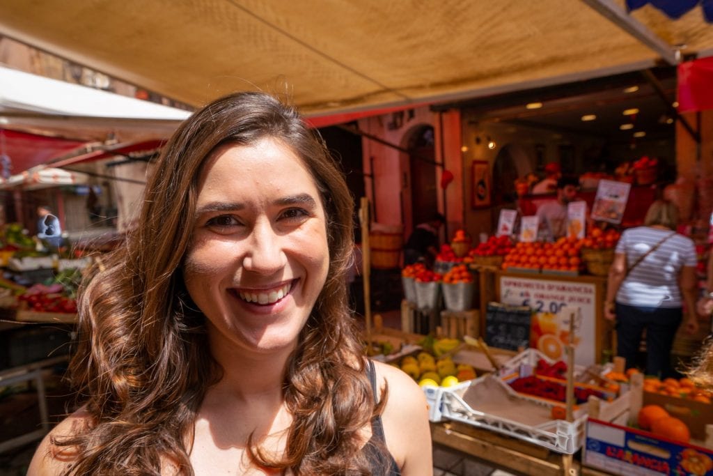kate storm visiting an outdoor market during a week in palermo italy