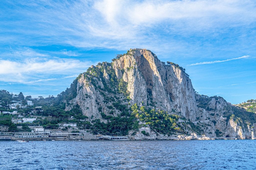 view of the island of capri italy as you approach by boat