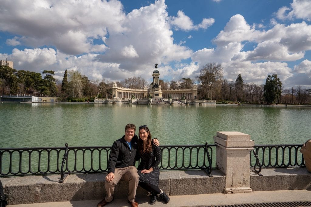 Kate Storm and Jeremy Storm in front of Retiro Park Lake