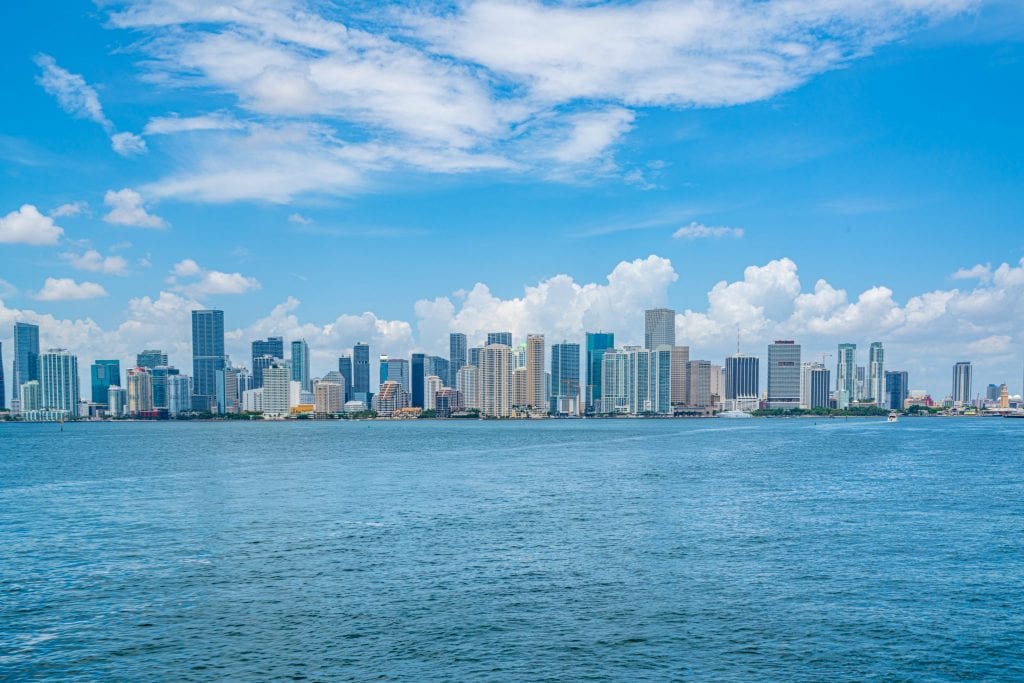 Skyline of downtown Miami as seen from a boat in the bay--plenty of Miami quotes cover how remarkable this city is!