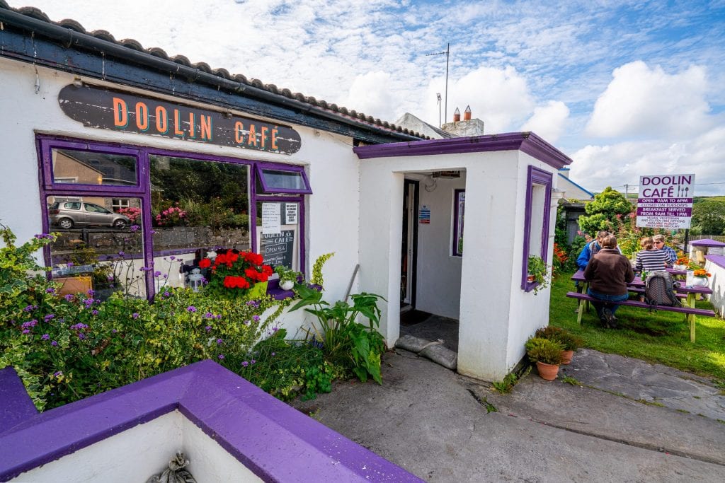 Photo of white and purple exterior of Doolin Cafe