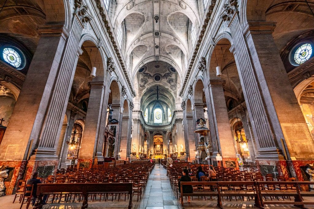 Interior of Church of Saint Sulpice in Paris--when trying to learn how much a trip to Paris costs, keep in mind that many gorgeous spots like this are free to visit!