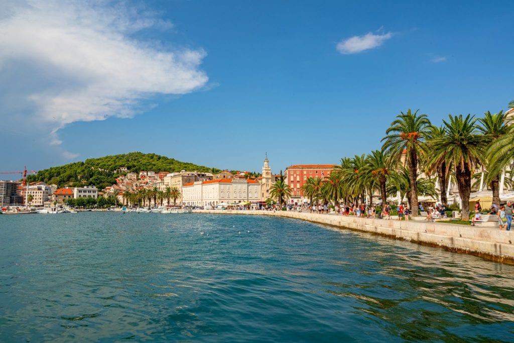 view of the riva in split croatia on a sunny day with water in the foreground