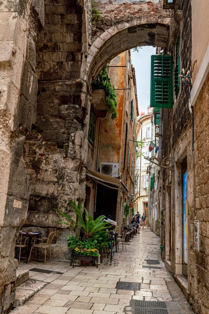 view of narrow stone street inside diocletians palace as seen when visiting split one day itinerary