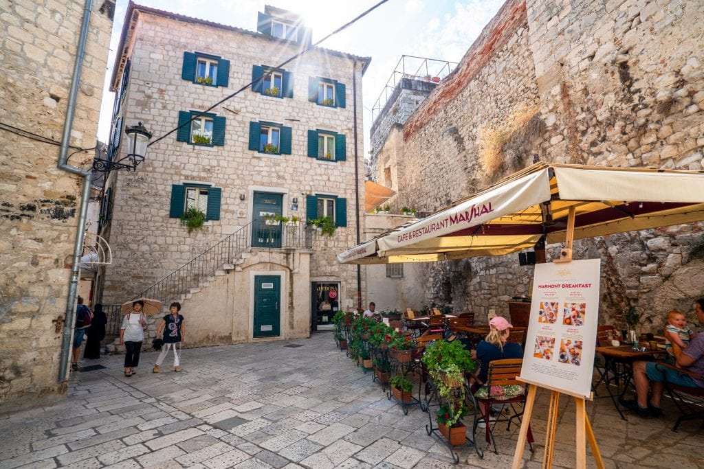 Small square in Split Croatia with a sunflare--quiet spots like this are one of the best things about seeing Split in one day!
