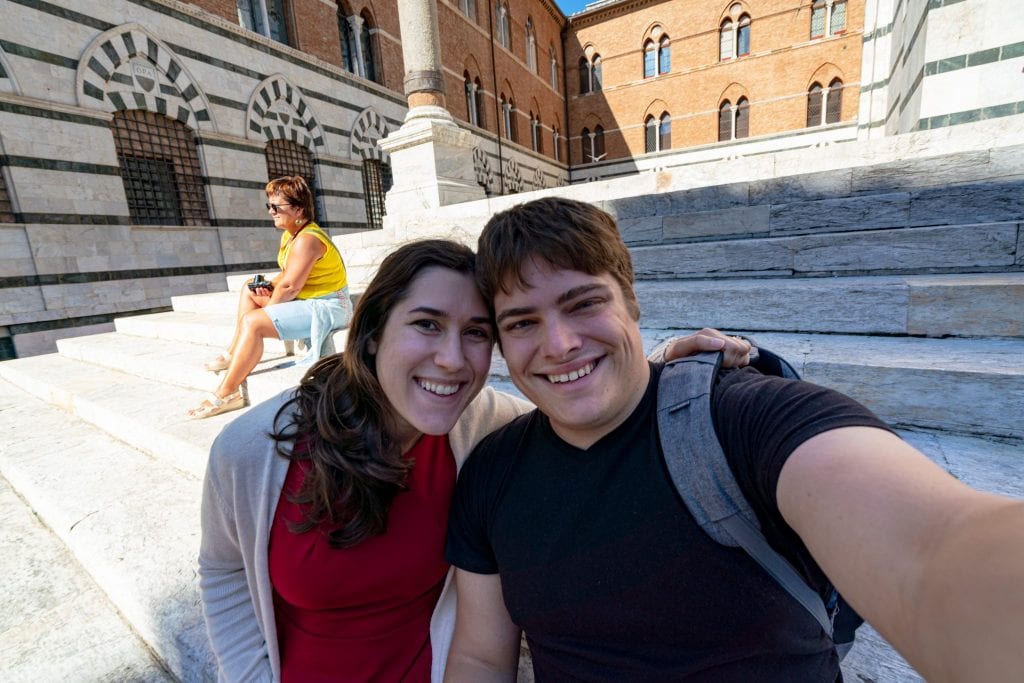 kate storm and jeremy storm taking a selfie when visiting siena for a day