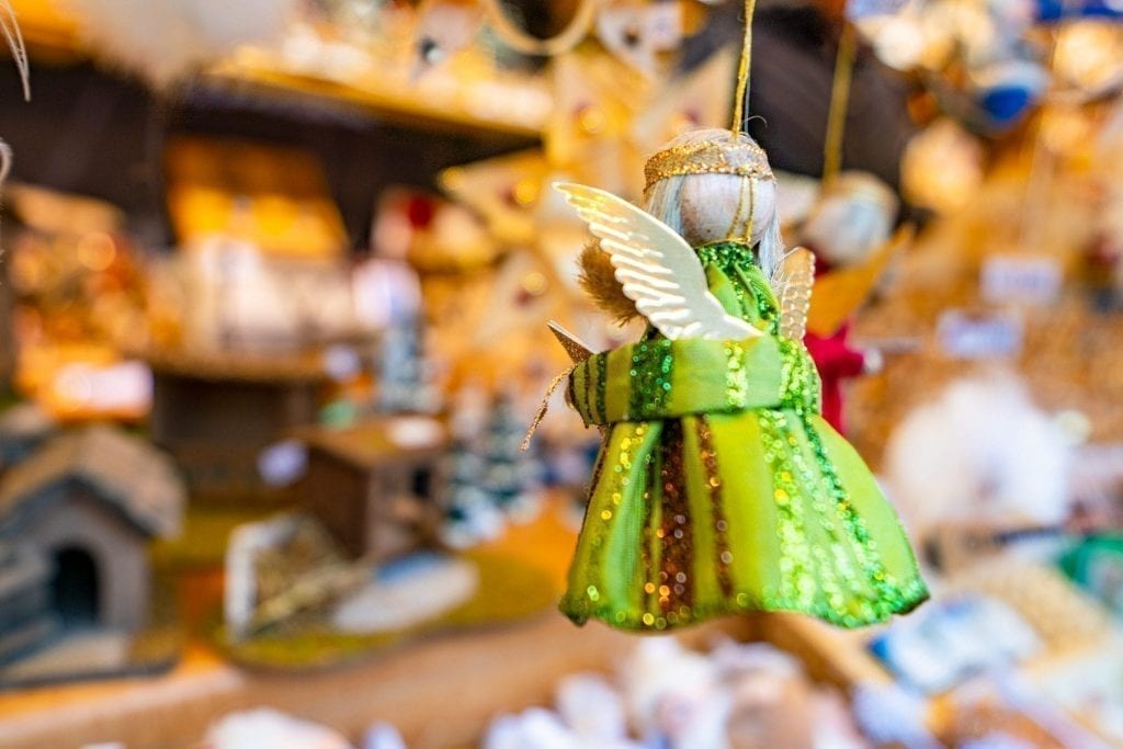 carved green anel ornament for sale at a german christmas market, one of the things to buy at christmas markets europe