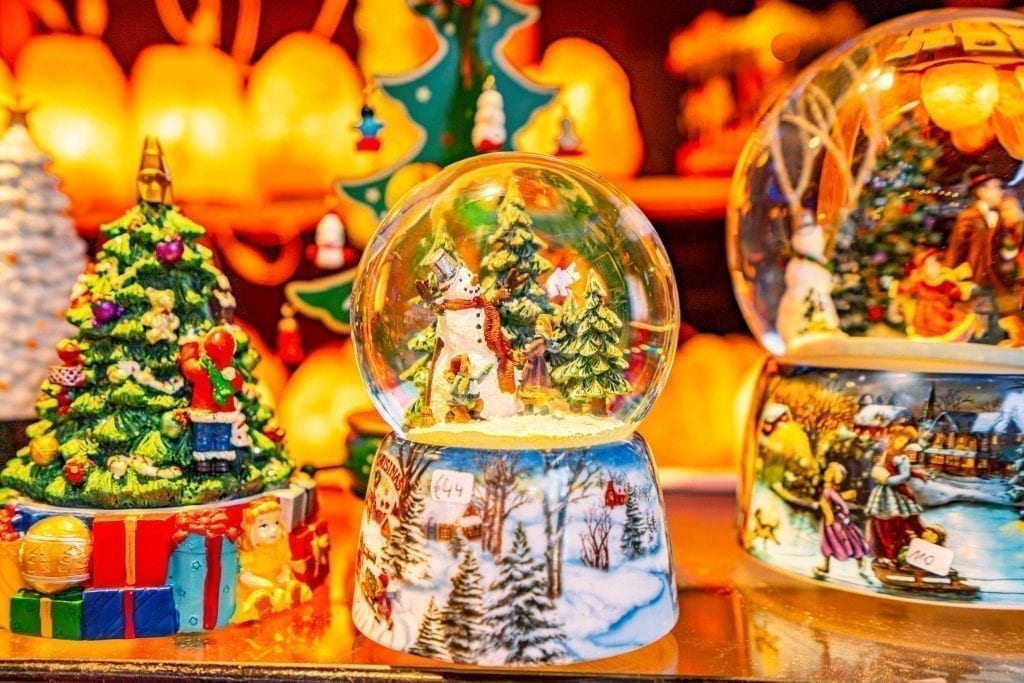 snow globes for sale at one of the christmas markets in belgium december