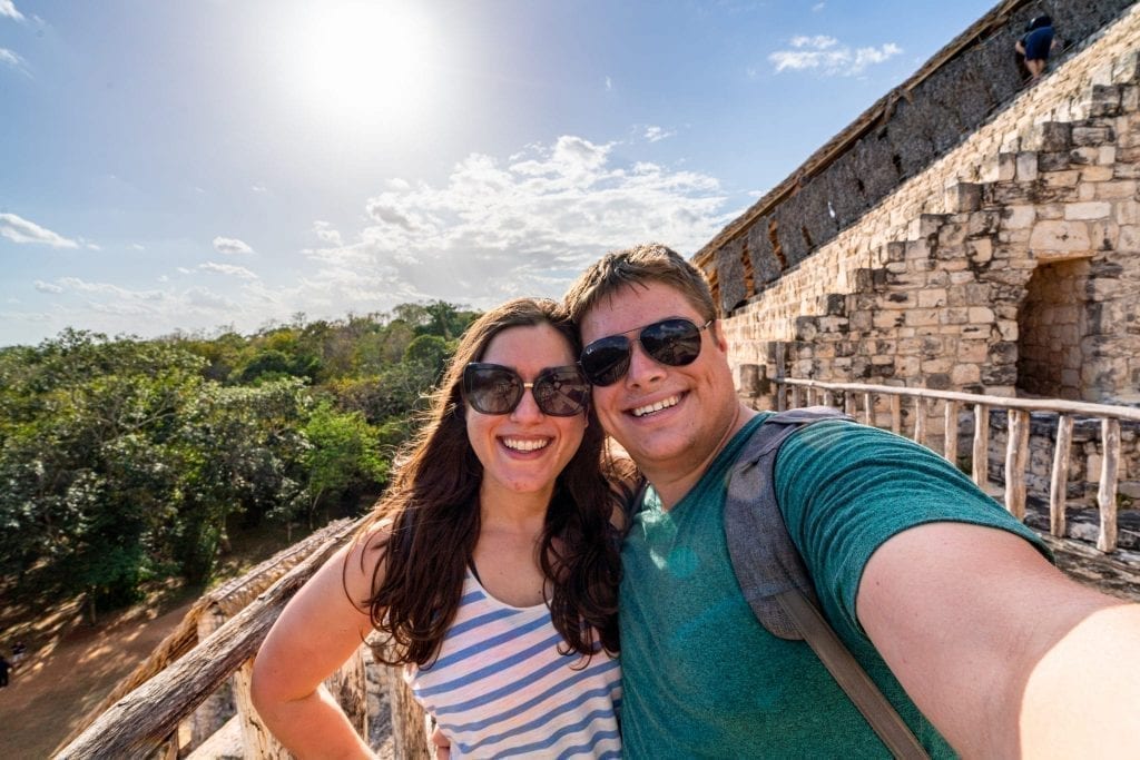 Kate Storm and Jeremy Storm taking a selfie on Ek Balam's main pyramid