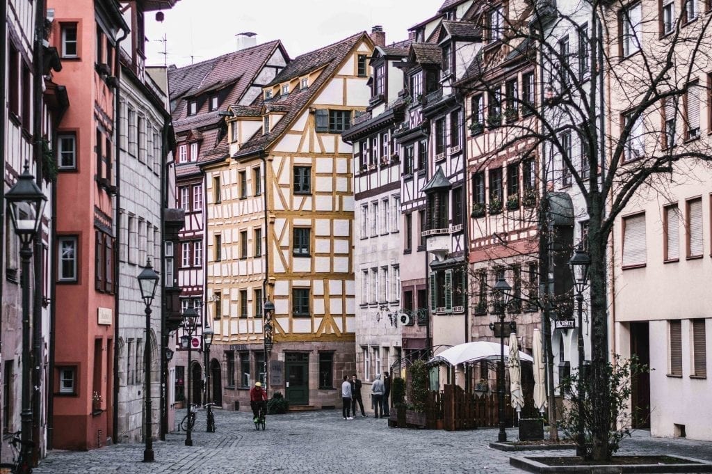 Colorful half-timbered houses on a quiet street in Nuremberg Germany