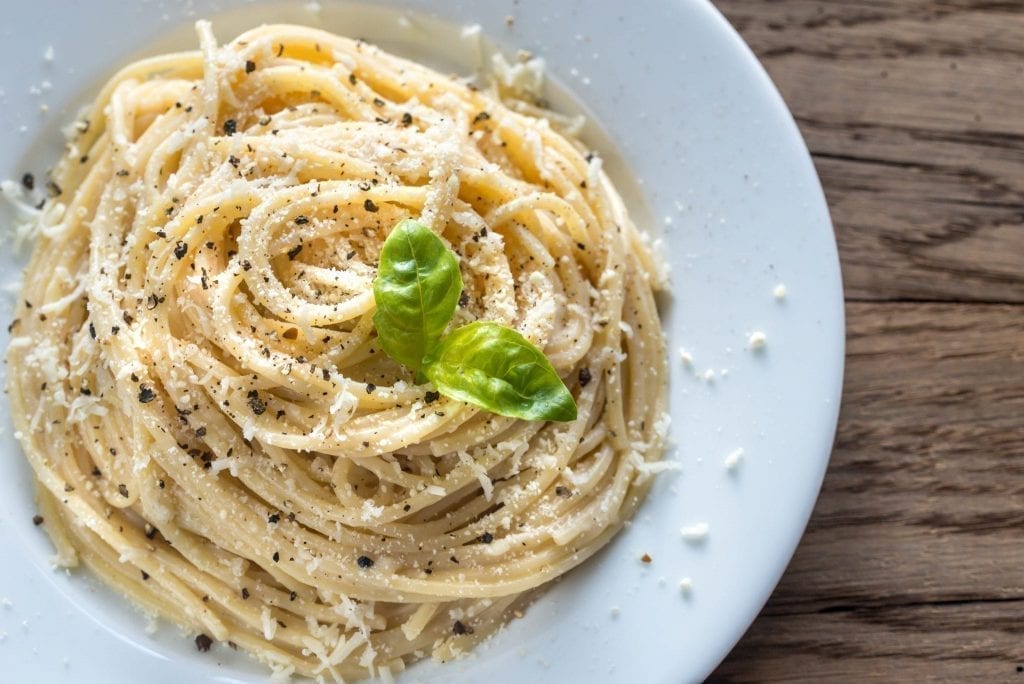 Plate of cacio e pepe shot from above, one of the best things to eat in Rome Italy