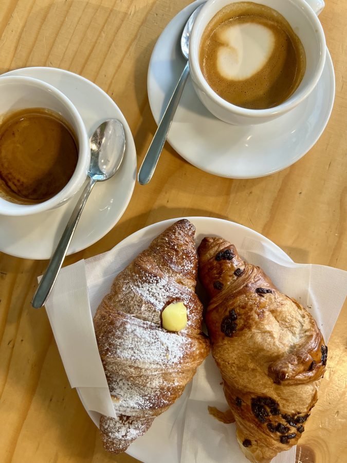 two cornetti and two coffees enjoyed as a typical italian breakfast at a bar