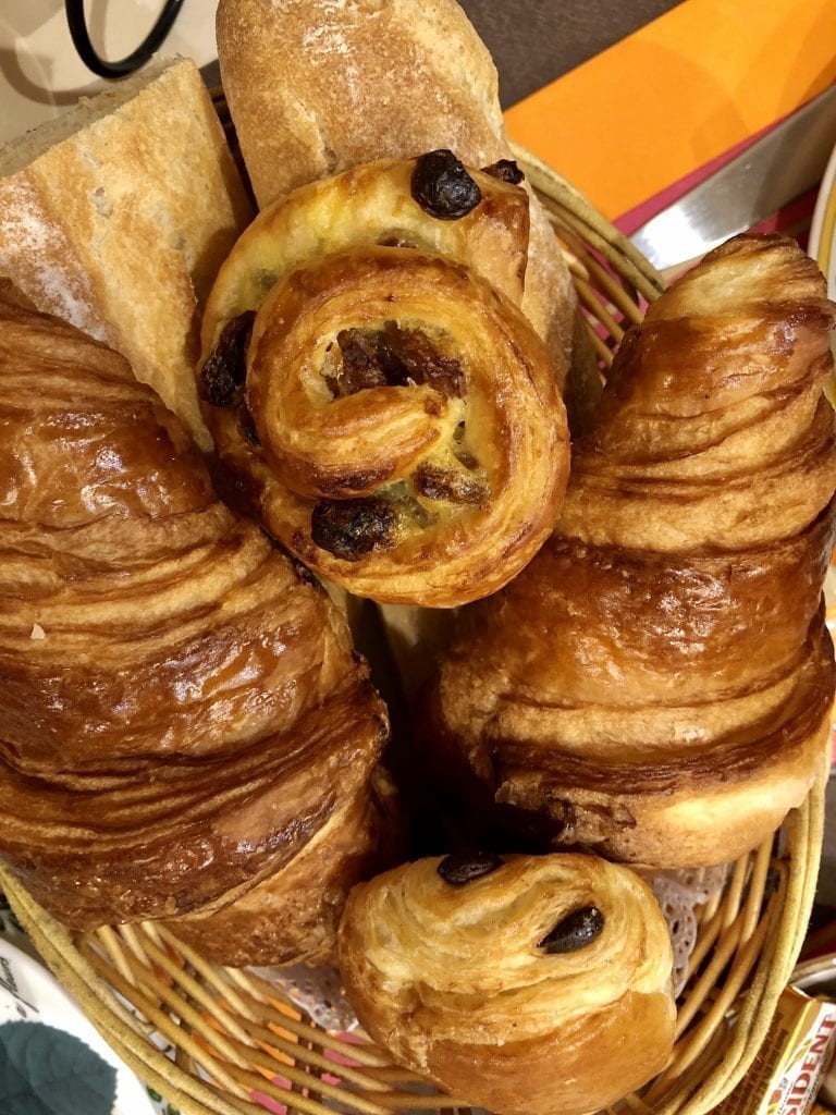 Basket of French pastries served for breakfast in France