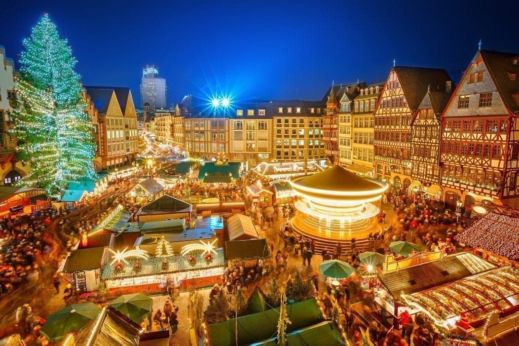 View of one of the best Christmas markets europe has to offer in Frankfurt as seen from above during blue hour