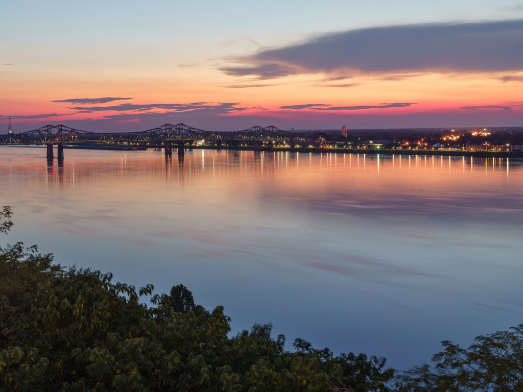 sunset over the mississippi river, one of the top tourist attractions in usa