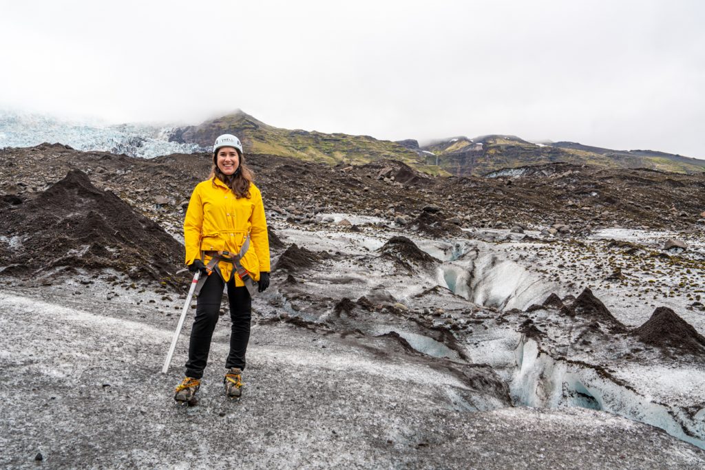 kate storm in a yellow jacket on vatnajokull glacier hike iceland