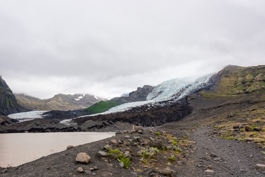 approaching the glacier from a dirt path, an unavoidable part of glacier hiking in iceland