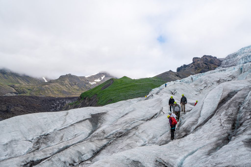 iceland glacier tour group hiking on the ice