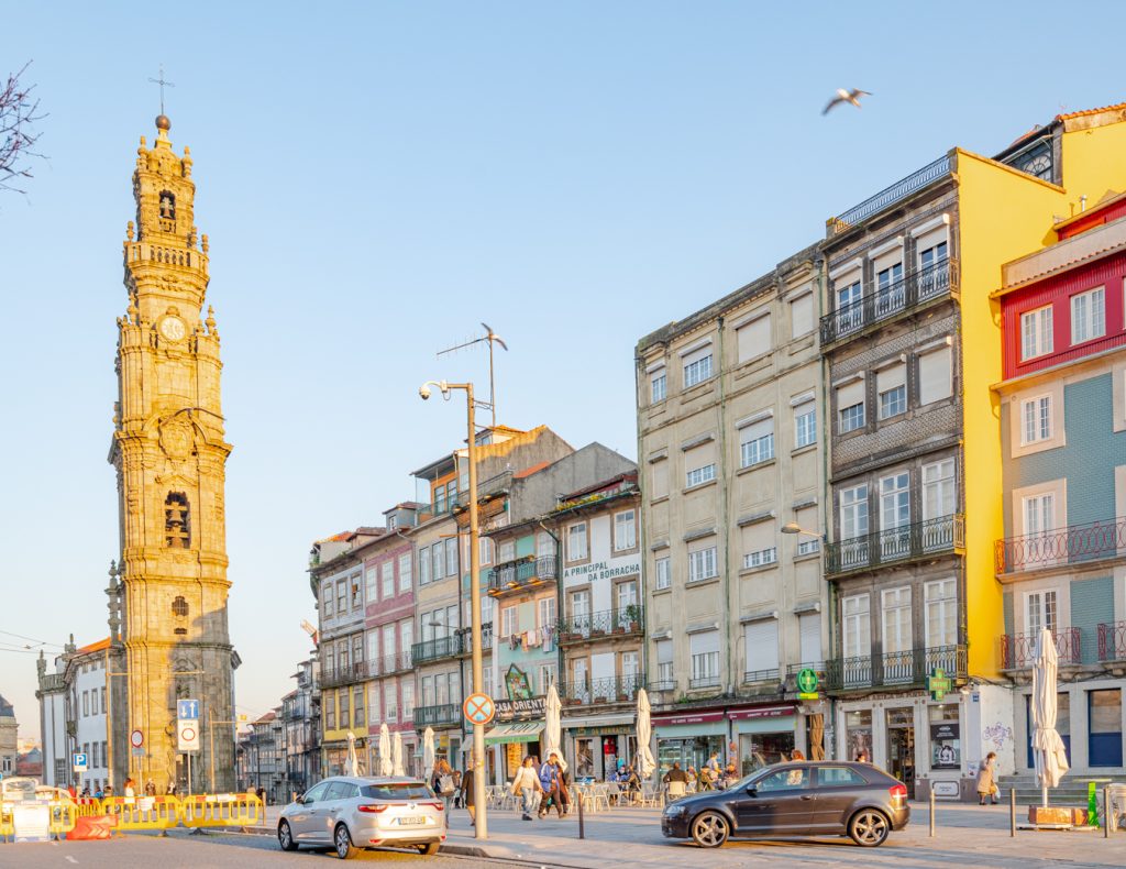 view of street in porto portugal with clerigos tower to the left