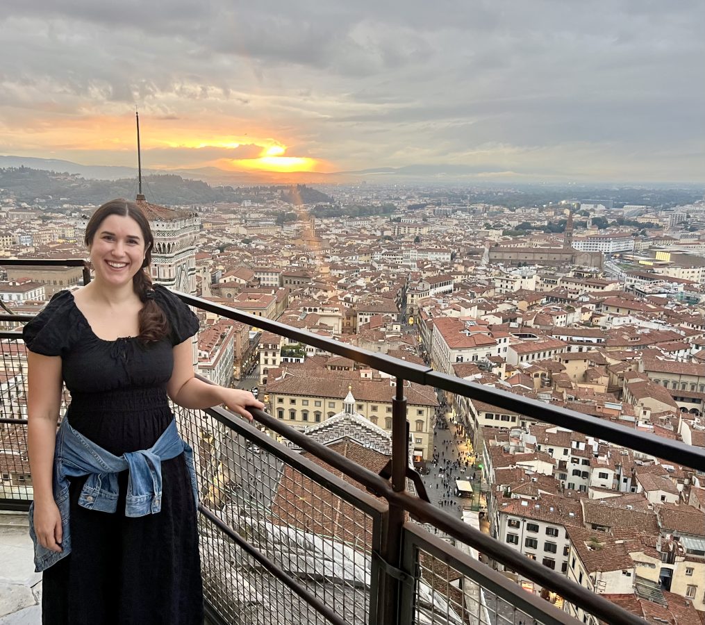 kate storm at the top of the florence cupola at sunset after climbing the duomo in florence