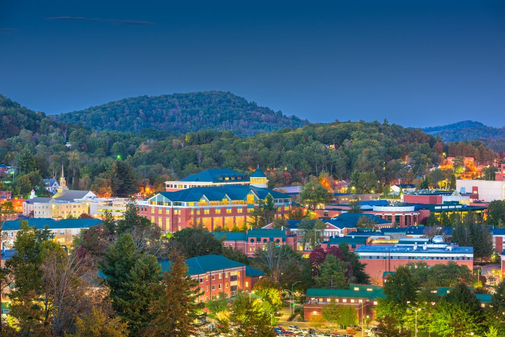 view of boone nc at night, one of the best north carolina mountain towns to visit