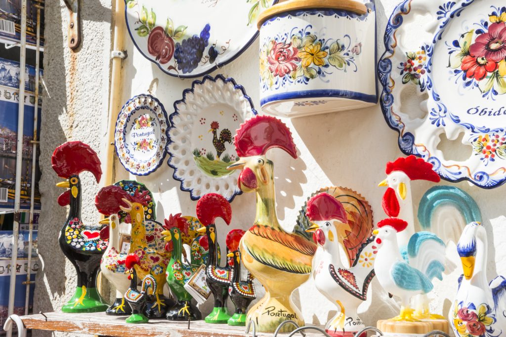 collection of portuguese ceramics for sale in a shop