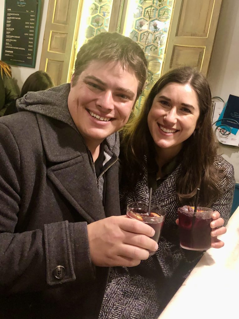 kate storm and jeremy storm drinking sangria in a madrid tapas bar
